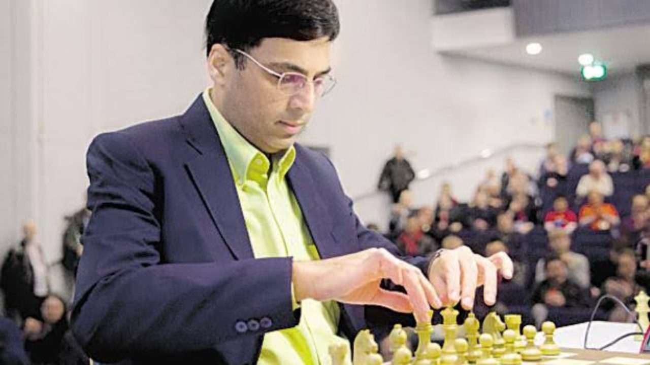 Former World Chess Champion Viswanathan Anand with his wife Aruna and son  Akhil arrives at